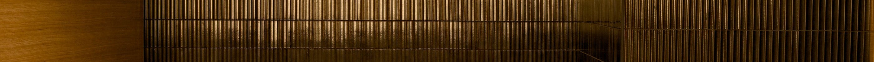 Gyu-Kaku Palm Jumeirah dining interior with Yuki Border Speckled Black tiles