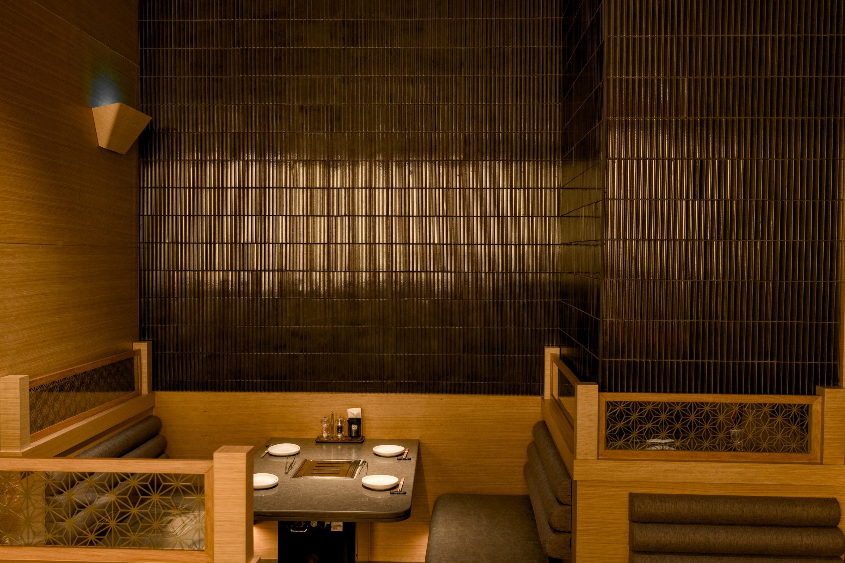 Gyu-Kaku Palm Jumeirah dining interior with Yuki Border Speckled Black tiles