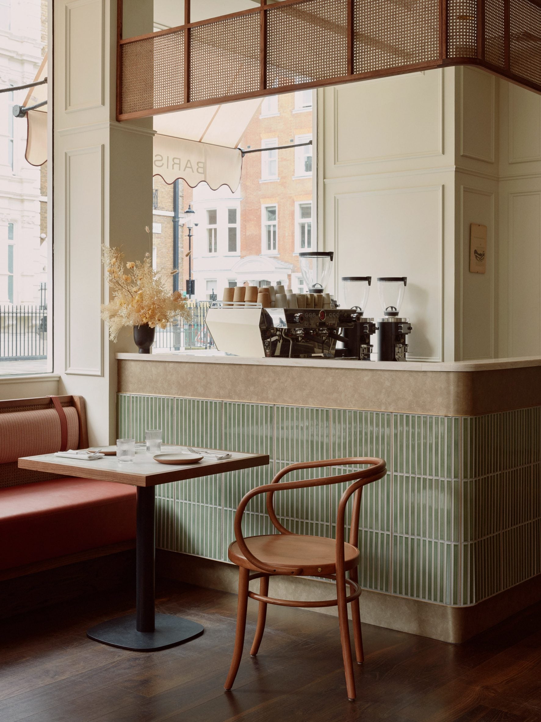 Arcaico Green tiled counter and seating at Sloane Street Deli, London