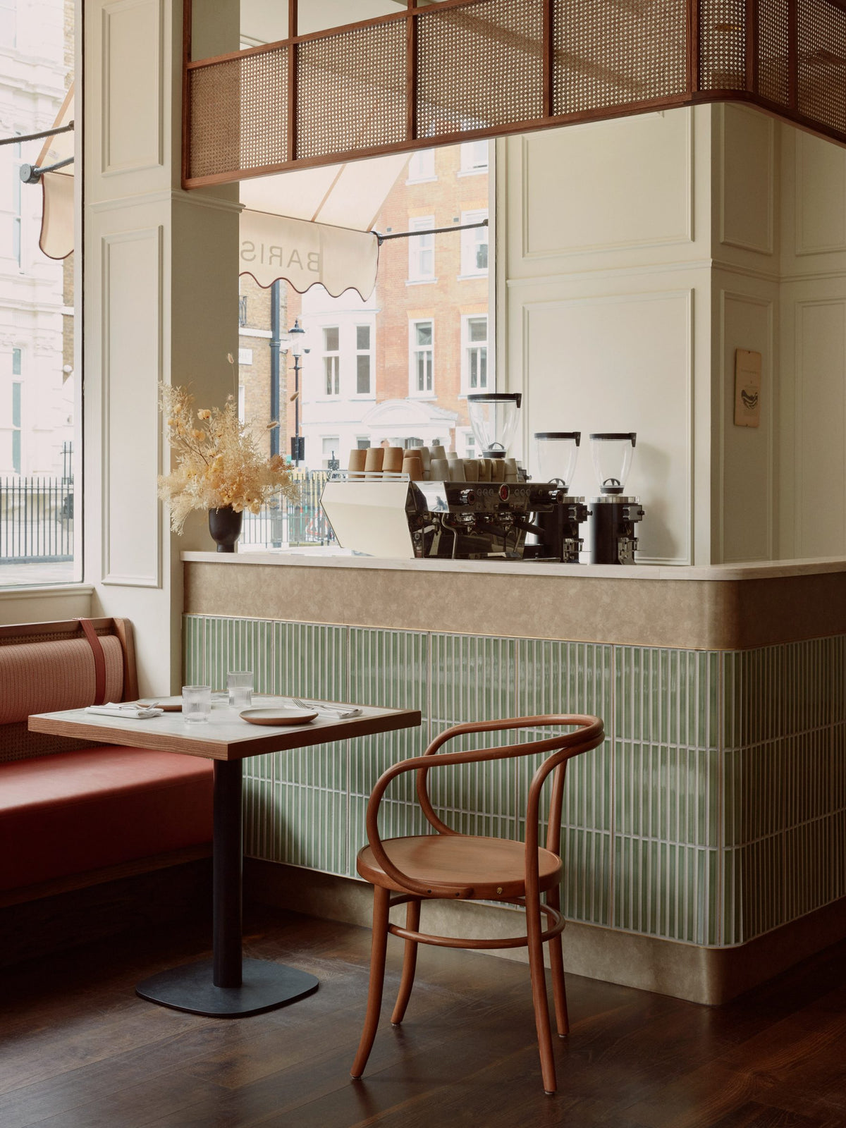 Arcaico Green tiled counter and seating at Sloane Street Deli, London