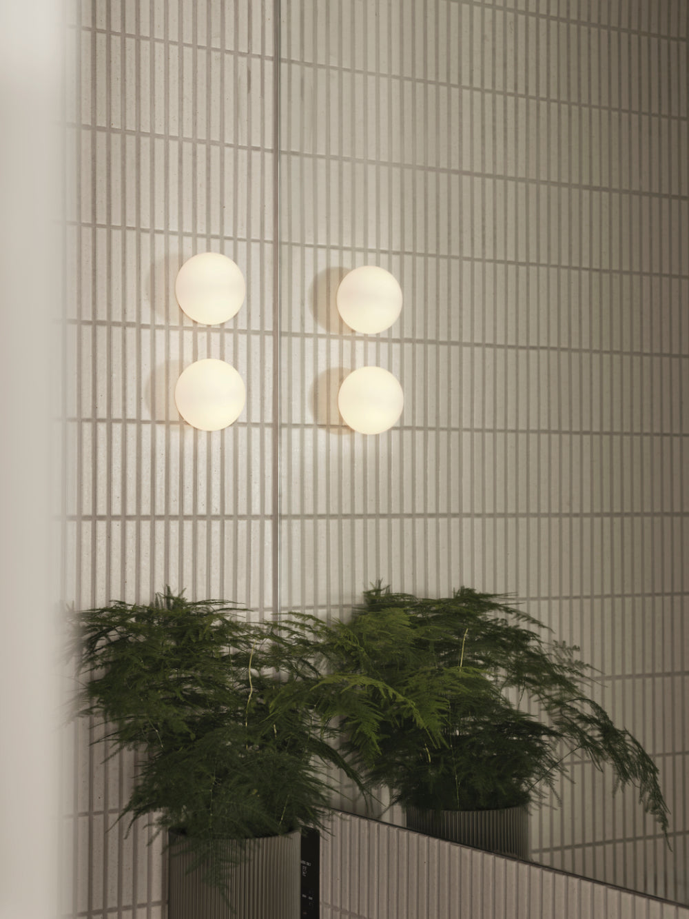 Kaji Border Powder White wall and lighting at Hoxton Square
