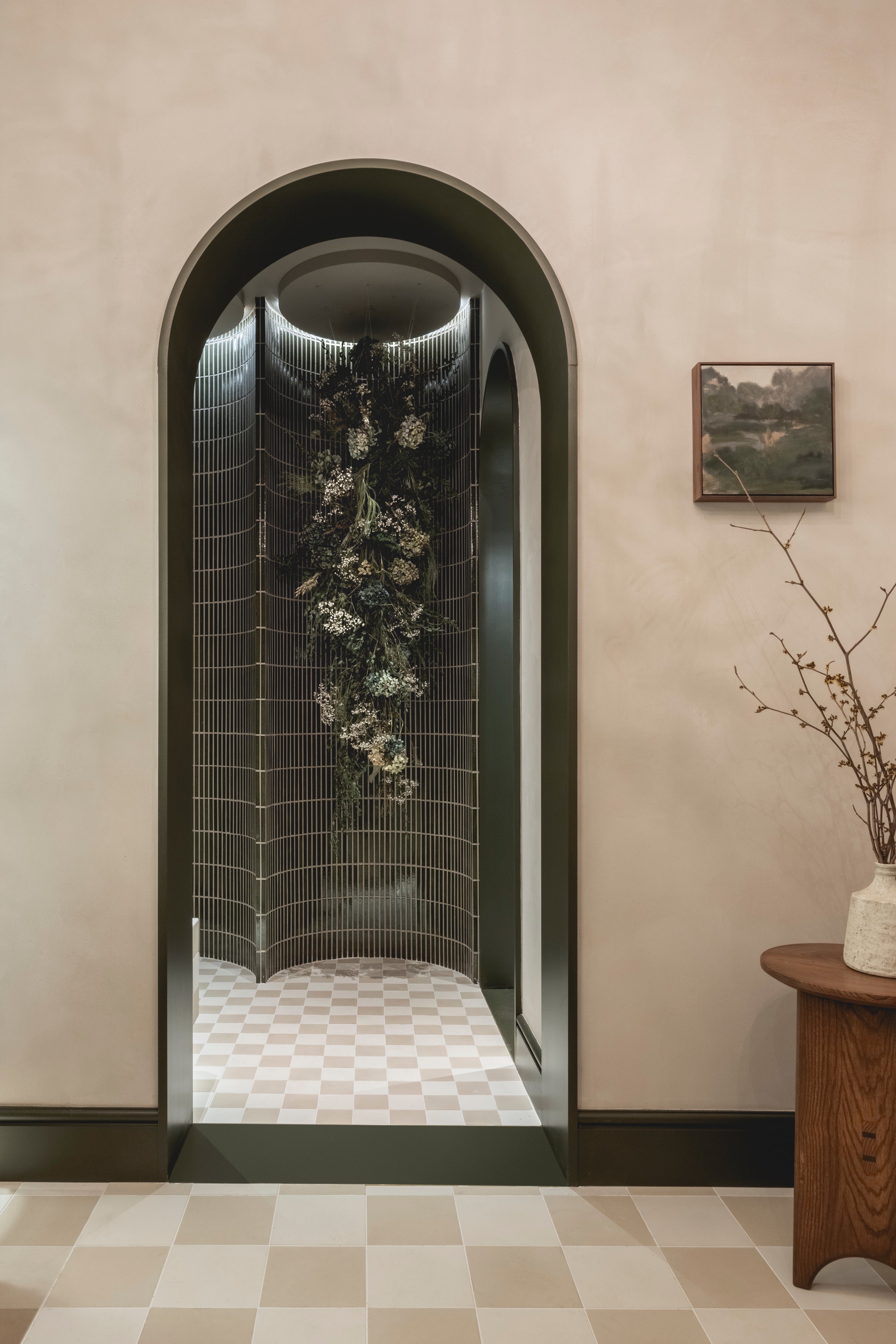 Arched doorway in the WOW House primary bathroom