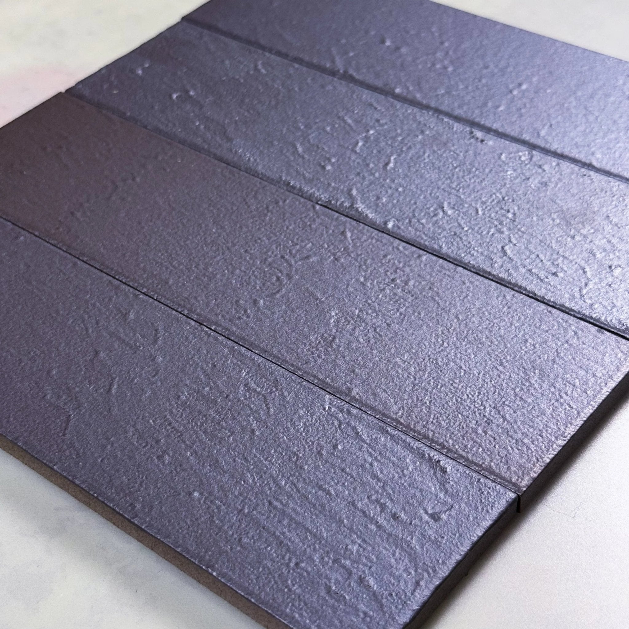 Japanese ceramic wall tiles Metal Brick Sample in Ibushi Black from Mittsu Japanese Tiles