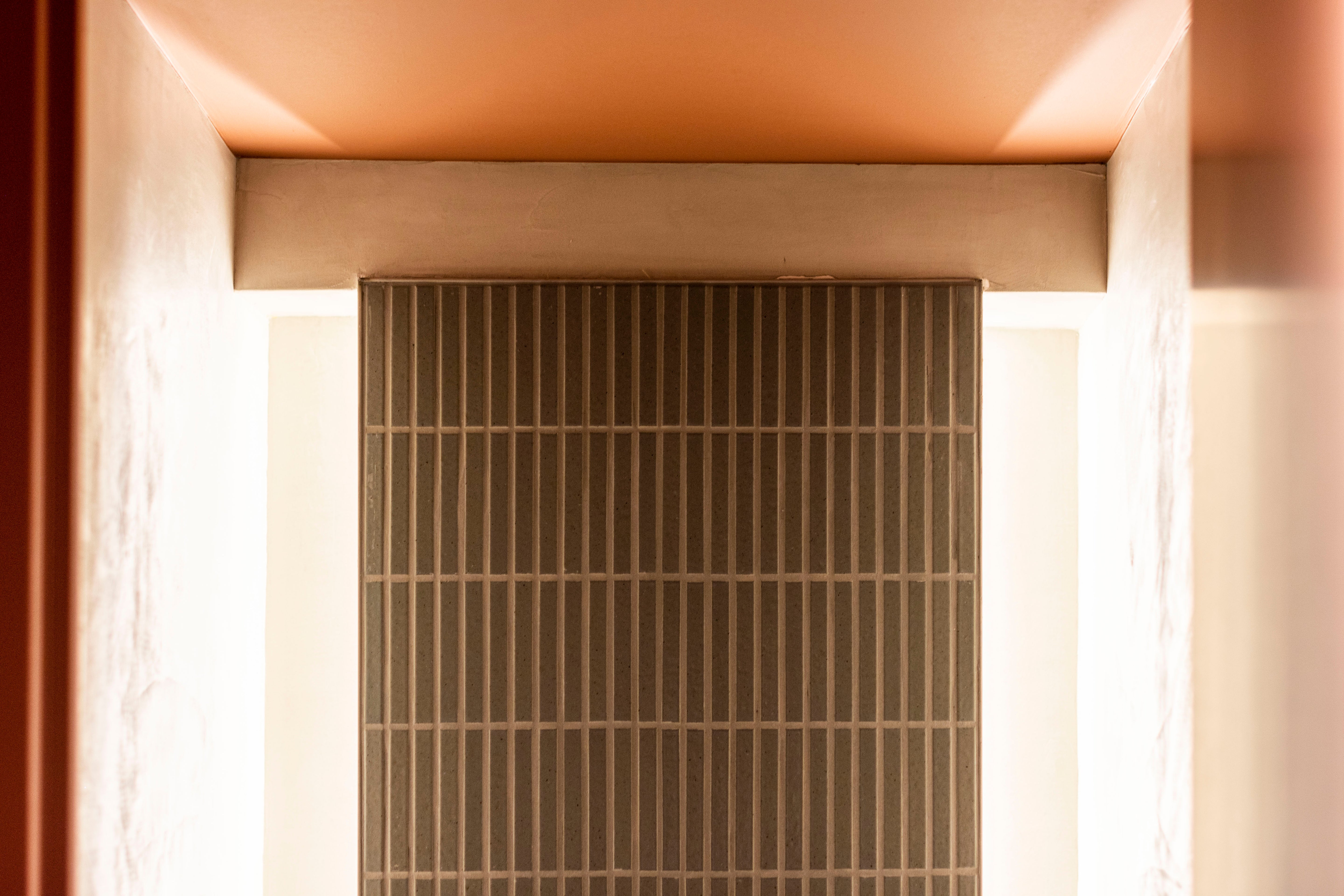 Framed vertical tile panel in Dove Grey at NEXT Amsterdam.