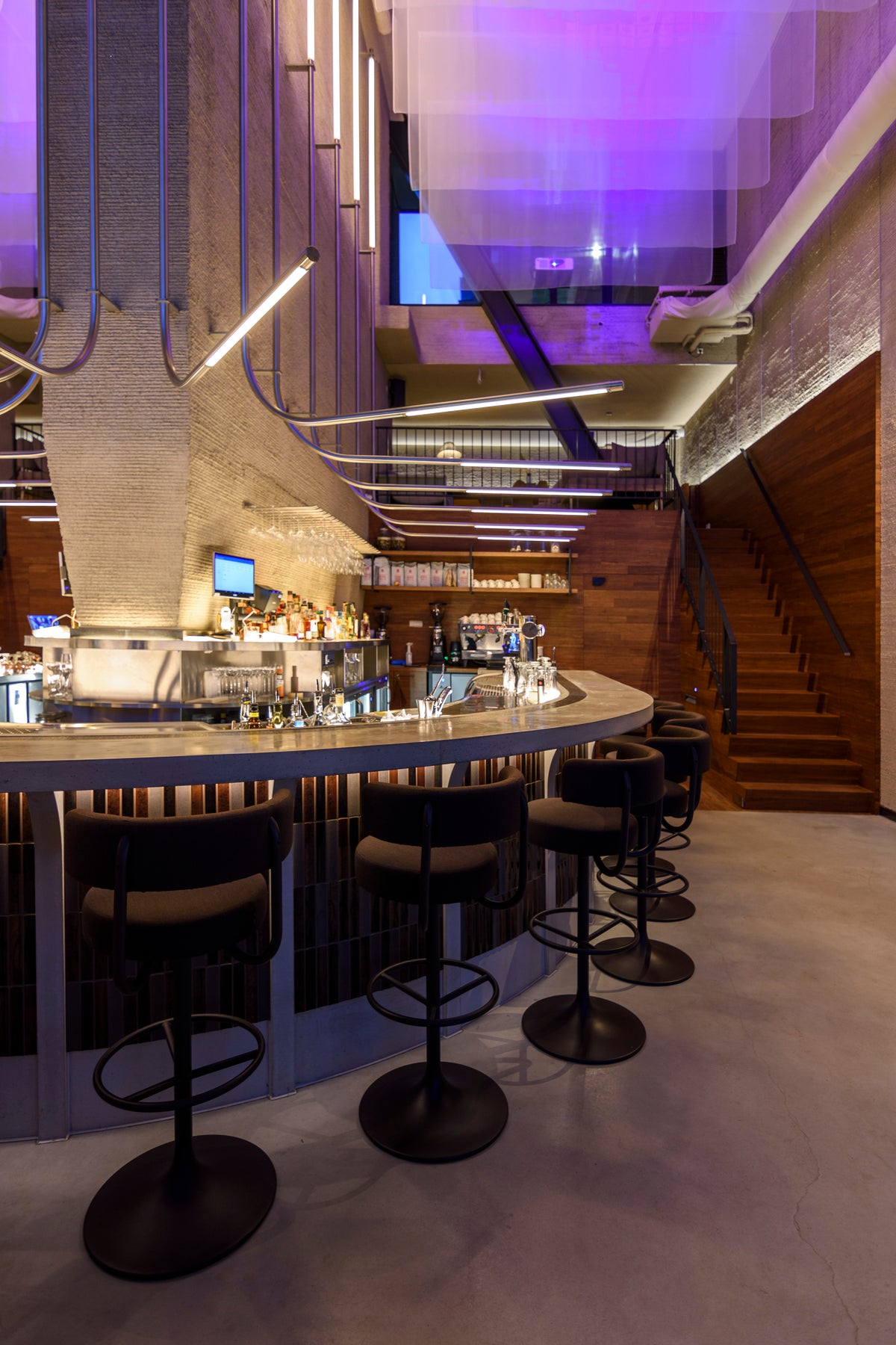 Side view of the tiled central bar at NEXT Amsterdam.