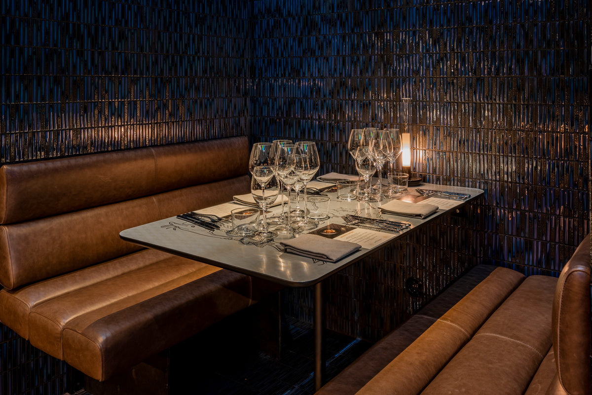 Yohen Dark Blue Mix glazed walls surrounding a dining table at Quality Caviar Stockholm.