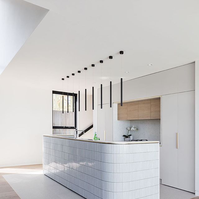 yuki border installations speckled white curved island 02