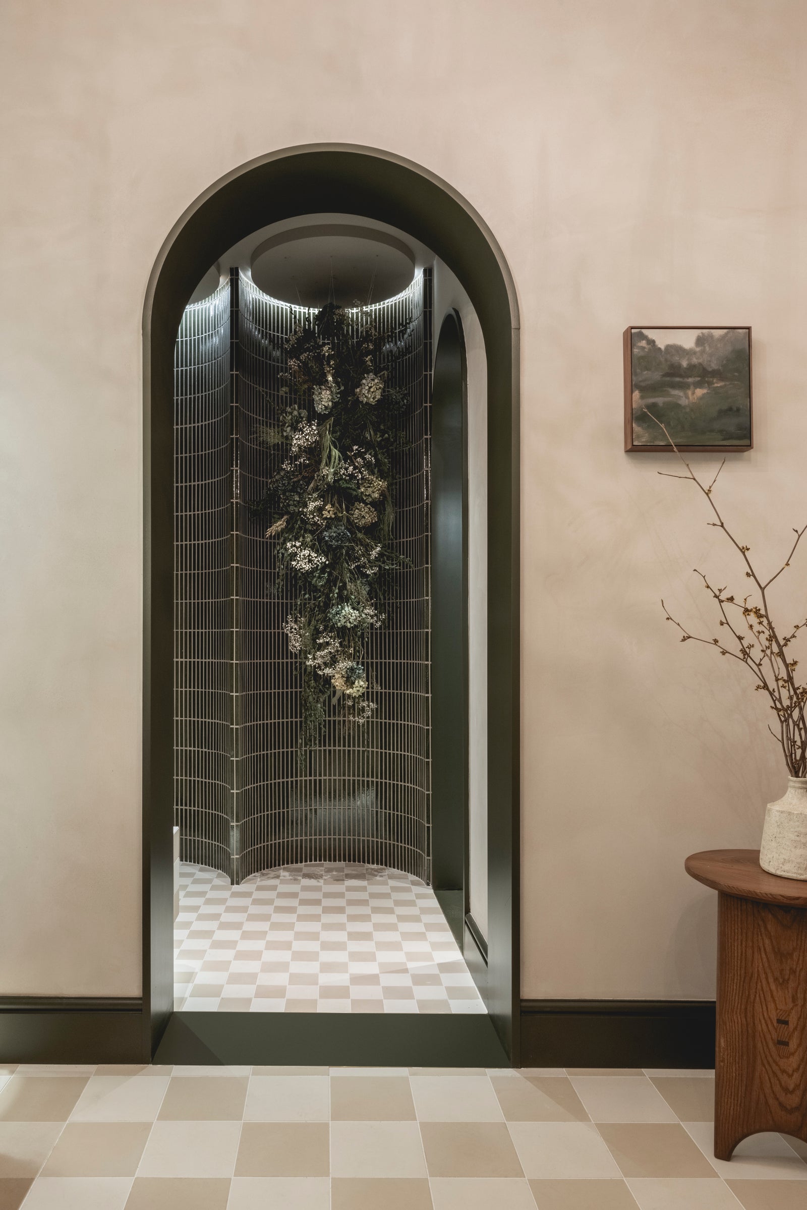 Arched doorway in the WOW House primary bathroom