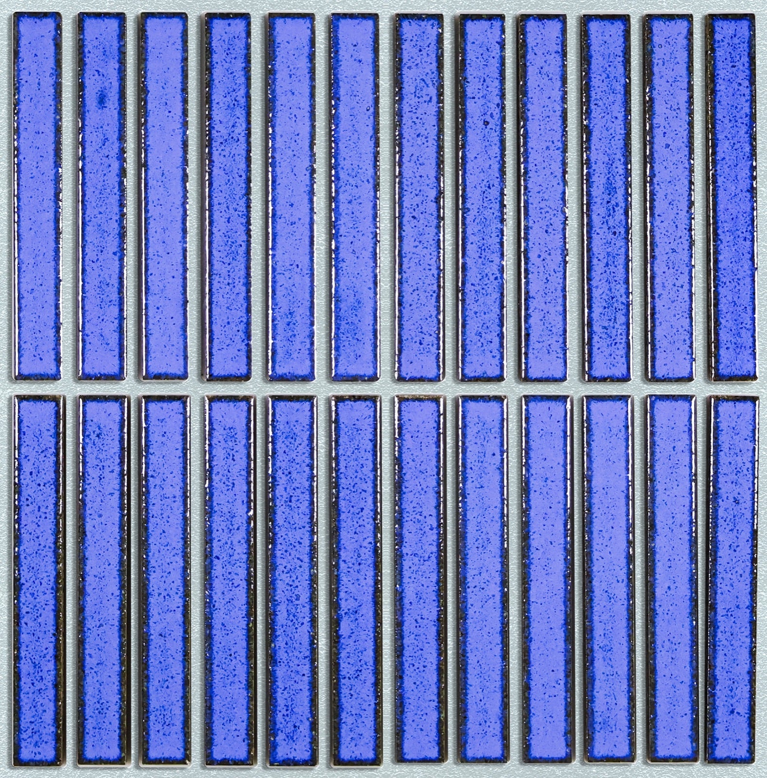 Kaji Border Blue tiles shown with simulated pale cool-grey grout