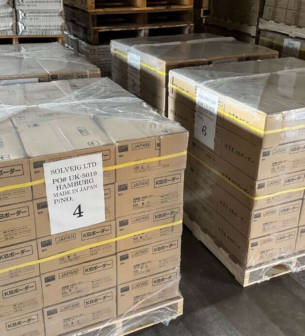 Prepared pallets of tile cartons in a warehouse