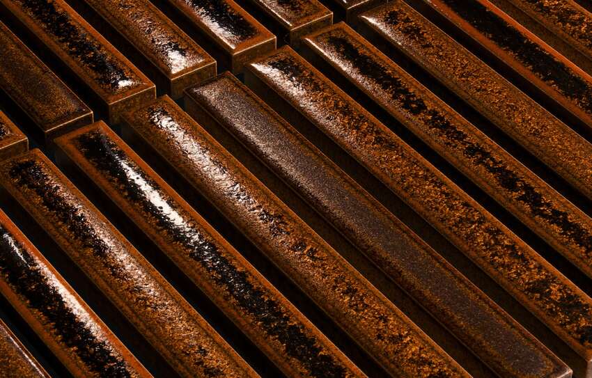 Detail of warm brown fired glaze and variation